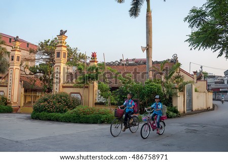 HAI DUONG, Vietnam, September 17, 2016 students, rural Hai Duong, biking to school