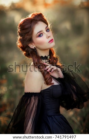 stock photo portrait of magnificent fashion gothic girl standing in glowing light fantasy art work amazing red 741791497