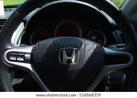 KUALA LUMPUR, January 13, 2016 : View of HONDA steering and meter. Focus on HONDA logo. A crop close up steering wheels
