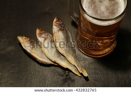Beer and dried fish. Russian snack .
