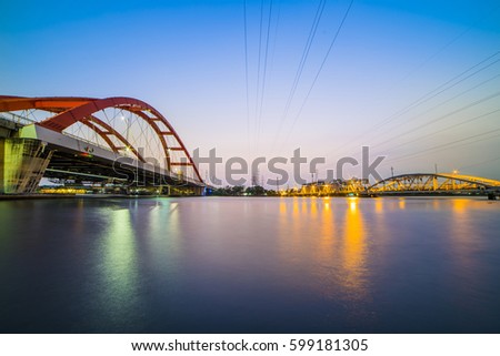 HO CHI MINH CITY, VIET NAM - MAR 13, 2017: Binh Loi bridge 1 and 2 in the same photo, Sai Gon, Viet Nam.