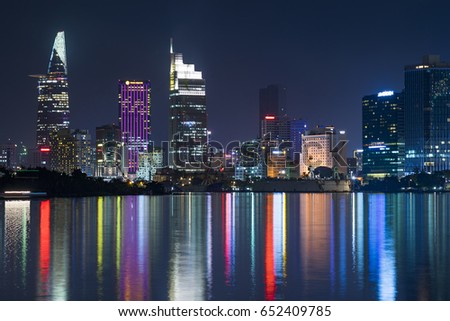 HO CHI MINH CITY, VIET NAM - JUNE 03, 2017: Ho Chi Minh city at night, Sai Gon, Viet Nam. View from Thu Thiem tunel to Bitexco tower and many other buidings.