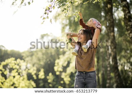 mother and daughter walking