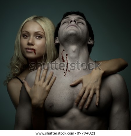 stock-photo-muscular-handsome-sexy-guy-with-pretty-vampire-woman-on-dark-background-glamour-light-89794021.jpg