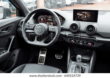 Vinnitsa,Ukraine - May 14, 2017.Audi Q2 concept car.Front of the car,front-side, logo Audi,TFSI,modern car.Presentation of the new model car - Audi Q2.Inside the car,steering wheel,interior of the car