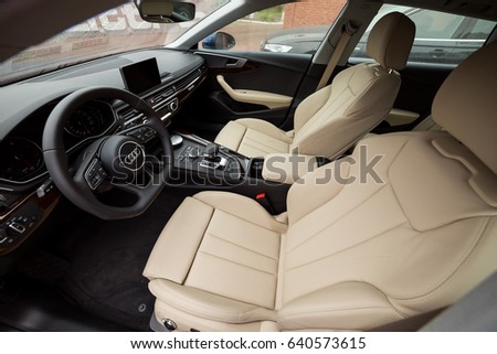 Vinnitsa, Ukraine - May 14, 2017. Audi A5 Sportback car.Front of the car, logo Audi,TFSI engine, quattro system, sportcar, luxury car,sport sedan. Presentation of the new model car- Audi A5 Sportback