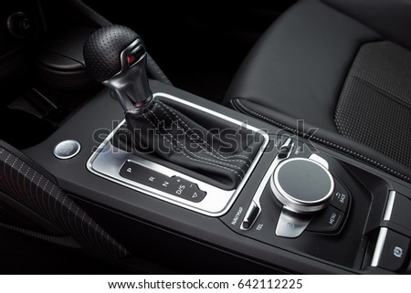 Vinnitsa, Ukraine - May 14, 2017. Audi Q2 concept car.Audi Q2 presentation.Front of the car,front-side, logo Audi,diesel, TFSI motor, showroom, modern car. Presentation Audi Q2. light car, mirror