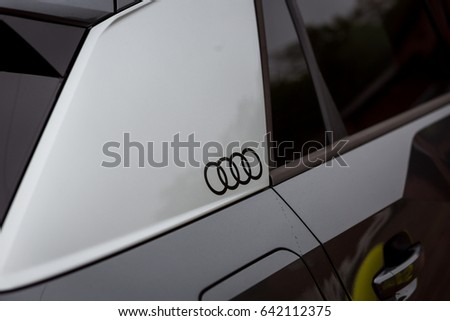 Vinnitsa, Ukraine - May 14, 2017. Audi Q2 concept car.Audi Q2 presentation.Front of the car,front-side, logo Audi,diesel, TFSI motor, showroom, modern car. Presentation Audi Q2. light car, mirror