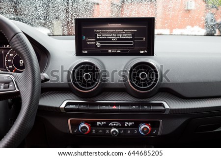 Vinnitsa, Ukraine - May 14, 2017. Audi Q2 concept car.Audi Q2. Front of the car,front-side, logo Audi, showroom, modern car. Presentation - Audi Q2.Inside the car,steering wheel,interior of the car