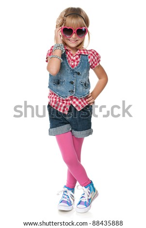 A portrait of a laughing fashion little girl; isolated on the white background