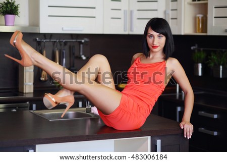 kitchen posing Pretty teen brunette