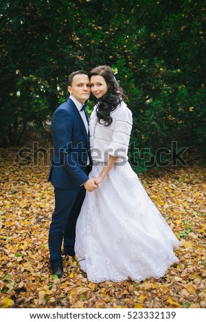 https://thumb7.shutterstock.com/display_pic_with_logo/4237354/523332139/stock-photo-wedding-photo-shoot-beautiful-groom-and-bride-in-nature-523332139.jpg