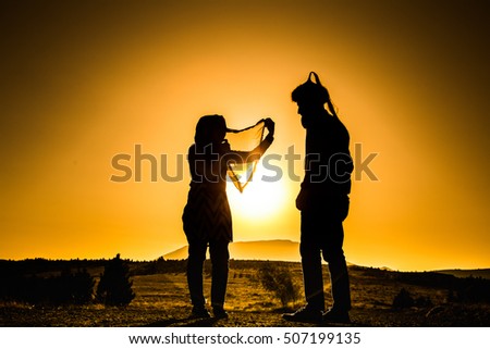Husband and wife silhouette Something is. Husband and wife silhouette join