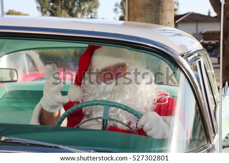 Santa Claus arrives in style in his Classic Car. Santa loves to deliver presents in his car when his Reindeer are tired. Santa Drives