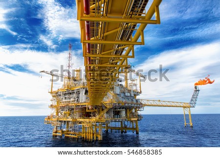 Offshore construction platform for production oil and gas. Oil and gas industry and hard work. Production platform and operation process by manual and auto function from control room.