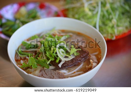 Beef rice noodles (Vietnamese cuisine called Bun Bo): a popular Vietnamese soup containing rice vermicelli and beef