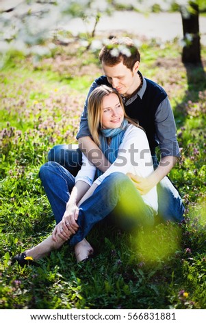 https://thumb7.shutterstock.com/display_pic_with_logo/4328221/566831881/stock-photo-tender-couple-in-love-sit-on-green-grass-under-blooming-cherry-tree-with-white-flowers-in-the-park-566831881.jpg