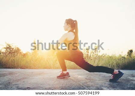 Woman exercise outdoor in Sunset