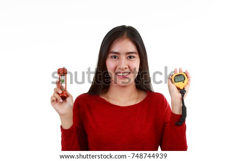 https://thumb7.shutterstock.com/display_pic_with_logo/4357831/748744939/stock-photo-portrait-of-young-asian-lady-checking-timer-by-hourglass-or-stop-watch-on-white-background-holding-748744939.jpg