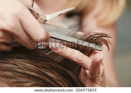 Close up of a haircut at a hair saloon