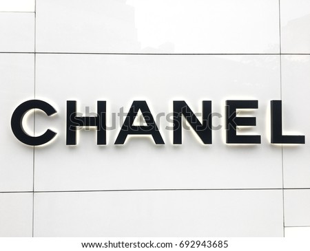 Chanel logo in front of chanel boutique store at Emquartier Shopping Mall Bangkok Thailand August 8,2017