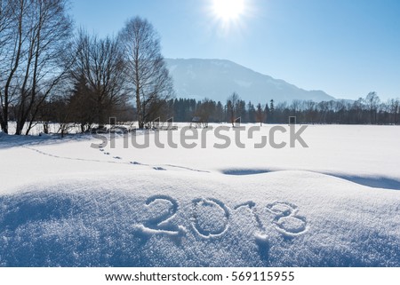 Year 2018 written at snow in Austrian Landscape