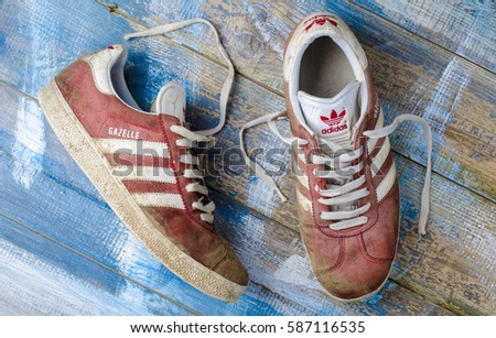 London, England - May 08, 2015: Pair of Adidas Gazelle Tennis Trainers, Adidas are a German Sports manufacturer founded in 1924