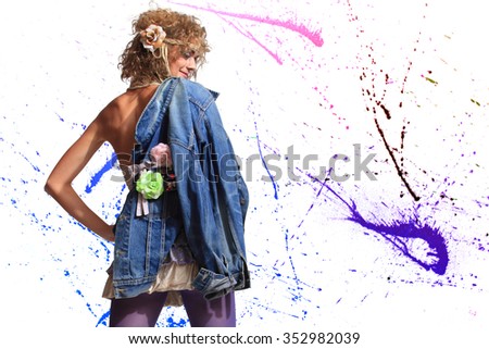 Fashion woman 80's style over pain splatter background