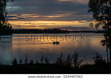 [Image: stock-photo-evening-view-of-people-fishi...487061.jpg]