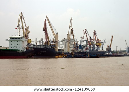 HAI PHONG, VIETNAM - AUGUST 4: Cargo ships in a port on August 4, 2012 in Hai Phong, Vietnam. Hai Phong port is one of the two biggest ports in Vietnam.