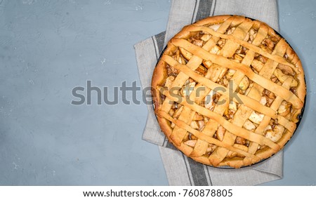 Apple Pie Tart With Raisins Nuts And Cinnamon On Vintage Background Texture Traditional Dessert Apple Pie Tart With Raisins Nuts And Cinnamon On Vintage Background Texture Traditional Dessert