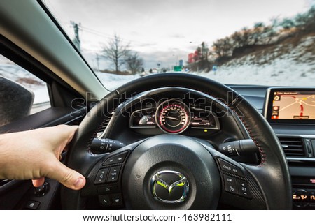 POLAND - JANUARY 20, 2016: Interior of new Mazda 3 captured with low depth of field technique. Mazda 3 is a popular compact car manufactured in Japan by the Mazda Motor Corporation.