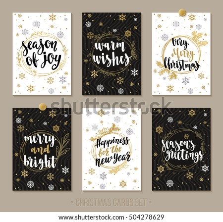 Set Christmas and Happy New Year greeting cards with handwritten brush calligraphy and decorative elements. Decorative vector illustration for winter invitations, cards, posters and flyers.