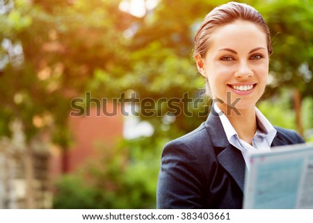 Portrait of business woman smiling outdoor