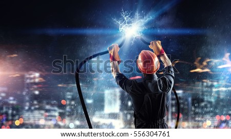 Electrician connecting cable . Mixed media