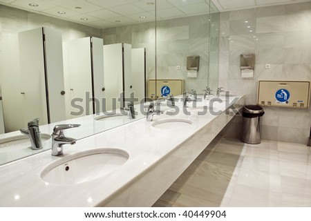 Public Bathroom Mirror woman public bathroom stock photos, royalty-free images & vectors Public Bathroom Mirror woman public bathroom stock photos, royalty-free images & vectors