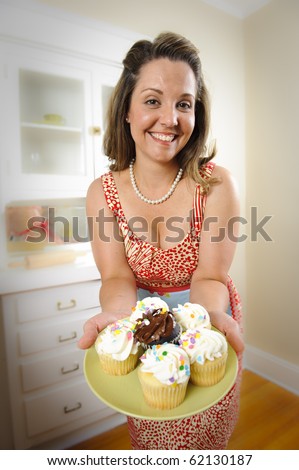 Woman Decorating Cupcakes retro woman baking stock images, royalty-free images & vectors Woman Decorating Cupcakes retro woman baking stock images, royalty-free images & vectors