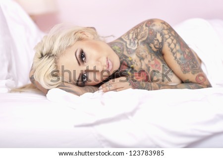lying naked under the covers asian nude girl doing group sex
