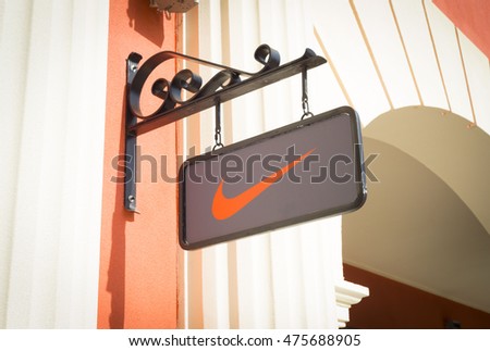 Sankt - Petersburg, Russia - 27 august 2016: Nike logo on a face of a store. Nike is an American company specializing in sports equipment based in Beaverton, Oregon, USA