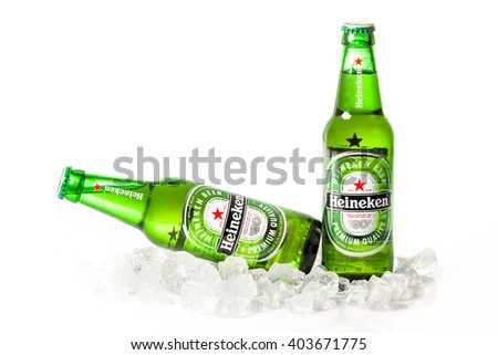 DUSSELDORF, GERMANY - APRIL 08, 2016: Bottle of Heineken Lager Beer on white background. Heineken Lager Beer is a pale lager beer produced by the Dutch brewing company Heineken International