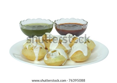 Stuffed panipuri with curd topping at shallow DOF - stock photo