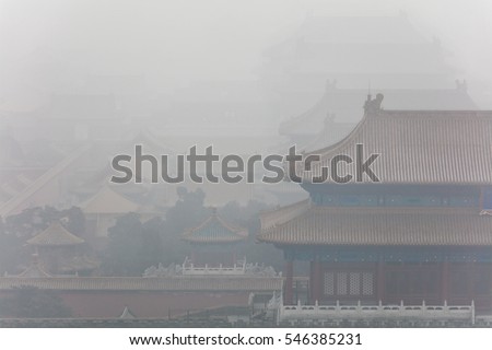 The Forbidden City shrouded by heavy smog. Beijing, China