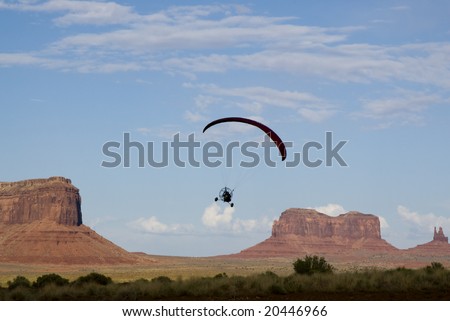 paraglider monument pilot flight powered valley shutterstock