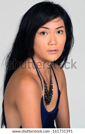 https://thumb7.shutterstock.com/display_pic_with_logo/5056/161731391/stock-photo-pretty-young-filipina-in-a-spaghetti-strap-blue-dress-161731391.jpg