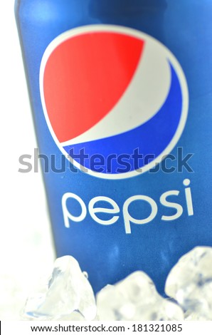 KWIDZYN, POLAND - MARCH 11, 2014: Pepsi drink in a can on ice isolated on white background. Pepsi is carbonated soft drink produced by PepsiCo. Pepsi was created and developed in 1893