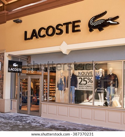 MONTREAL, CANADA - MARCH 6, 2016 - Lacoste outlet in Premium Outlets Montreal. The Premium Outlets is the second Premium Outlet Center in Canada located in Mirabel, Quebec.