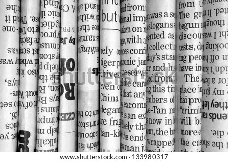A Black And White Background Of English Language Newspapers Stacked Folded In Vertical Position A Black And White Background Of English Language Newspapers Stacked Folded In Vertical Position