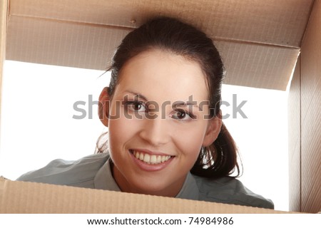 Thinking inside a box. Young business woman in cardboard box, ... - stock-photo-thinking-inside-a-box-young-business-woman-in-cardboard-box-isolated-on-white-74984986