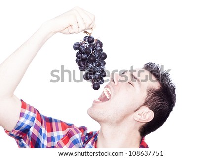 grapes eating man shutterstock