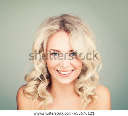 stock photo happy blonde woman with blonde curly hair smiling fashion model with wavy hairstyle 655578121
